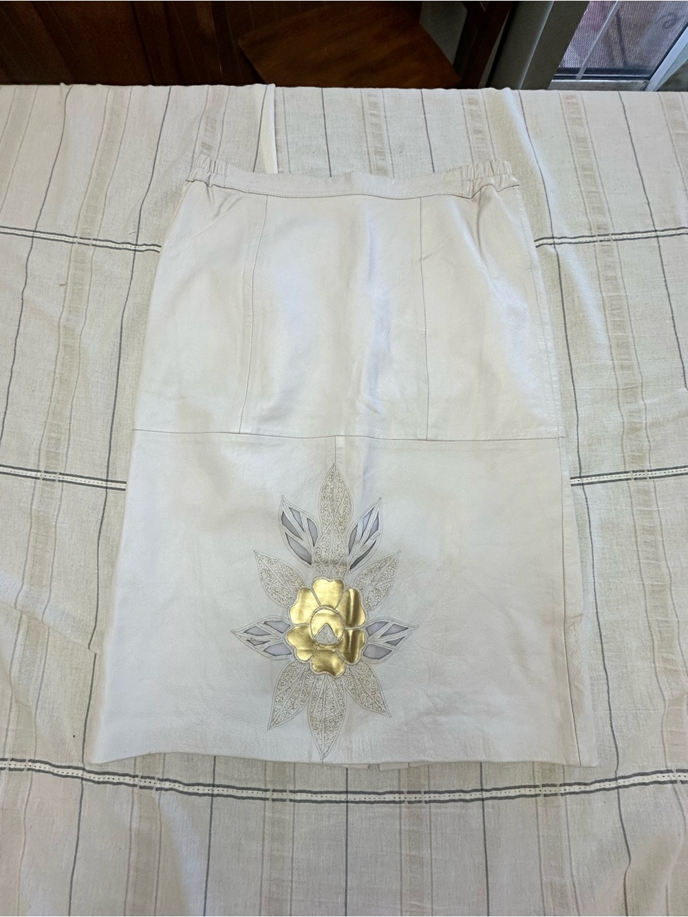 White Leather Midi Skirt with Gold Floral Accent